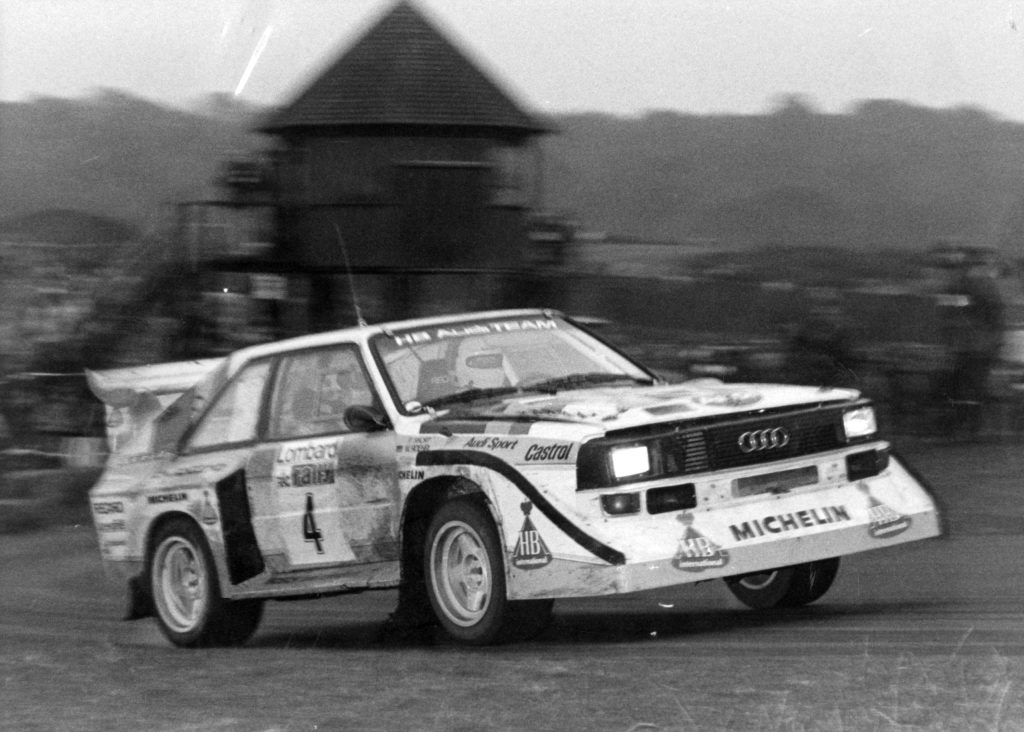 Group B Rally Car Audi racing action front three quarter black white