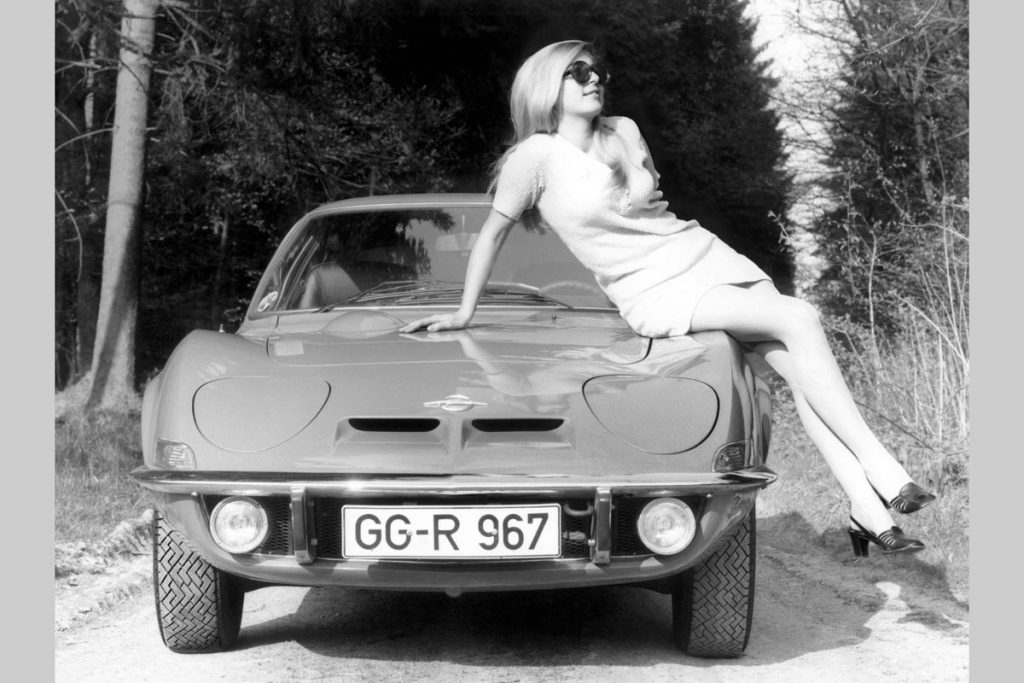 Opel GT head on woman